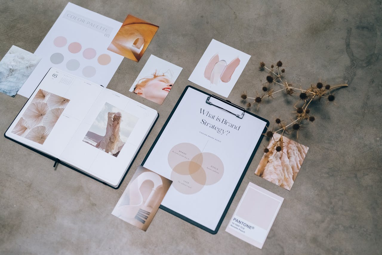 home-services-004 Flat lay of branding strategy materials with moodboard and color palette for creative design.